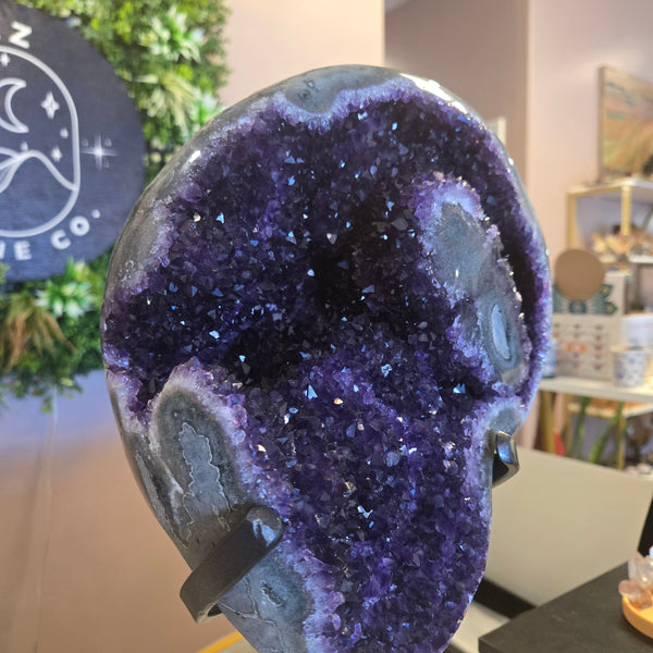 Amethyst geode on stand