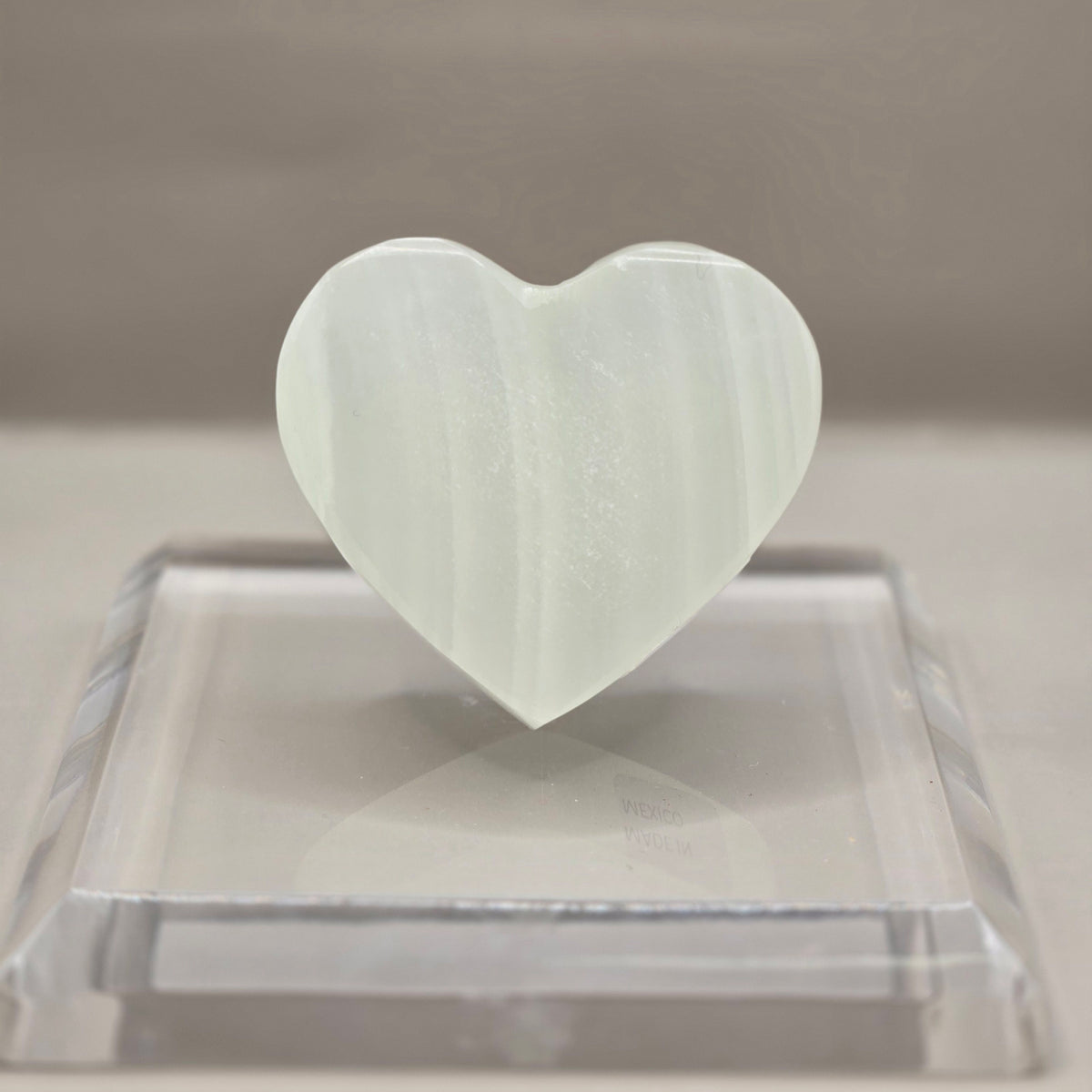 Green Calcite Heart Carving and Ceramic Hand Stand