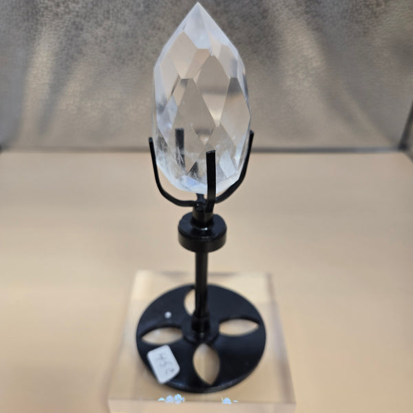 Faceted Quartz on rotating Stand