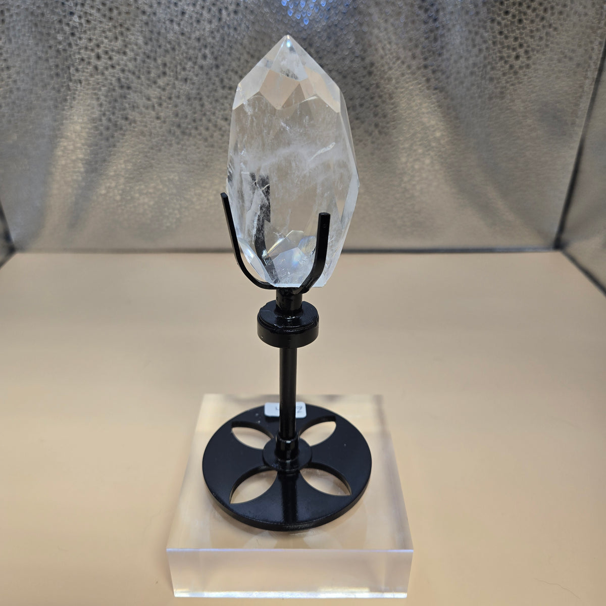 Faceted Quartz on rotating Stand