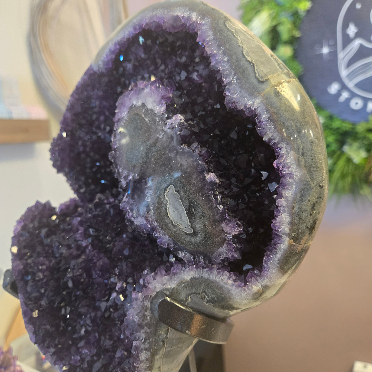 Amethyst geode on stand