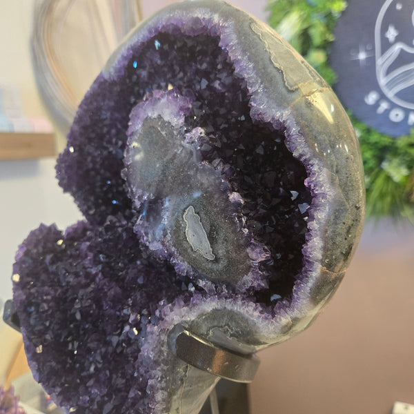 Amethyst geode on stand